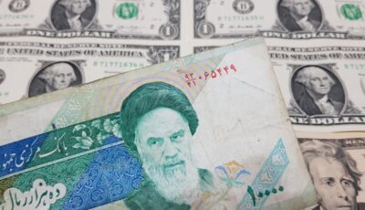 انخفاض قيمة الريال الإيراني إلى مستوى قياسي جديد